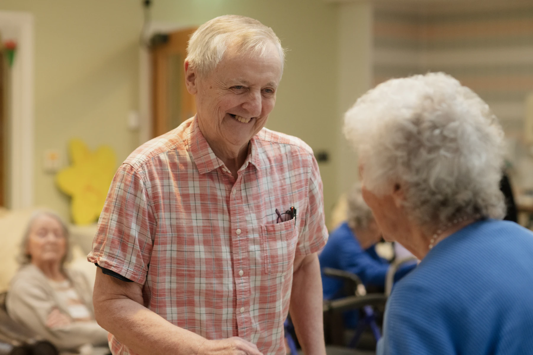 Older adults sharing a warm social moment